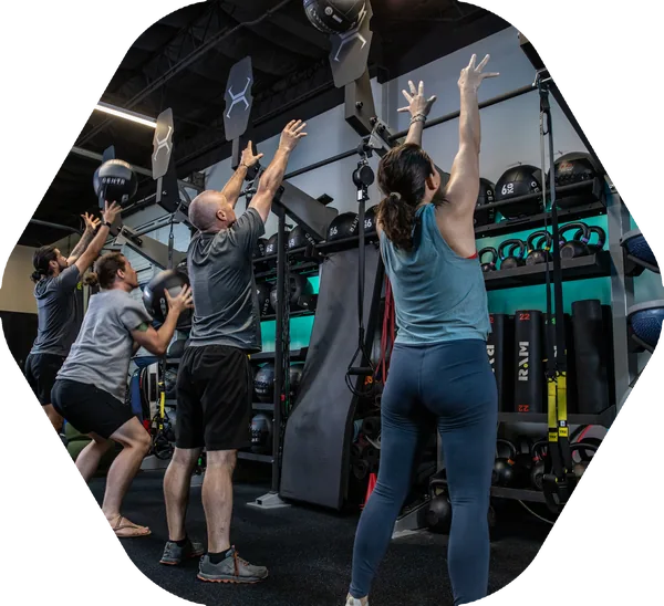 A therapeutic exercise class using medicine balls